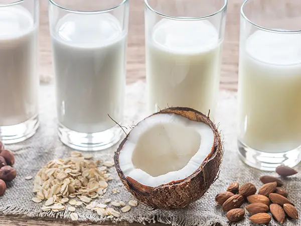 Plant Based Milk Alternatives are dairy free like soy milk, almond, milk, oat milk and coconut milk. Available at local food distributor Ginsberg's Foods restaurant supplies for coffee shops, healthcare, schools.